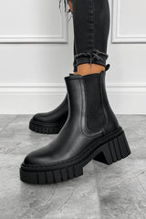 Our Sofia boots feature a super chunky platform sole, Chelsea boot design and elasticated side panels for an easy fit. Pair with some black ripped jeans to complete this look Material: Faux Leather Also available in blackSOFIA Chunky Platform Ankle Boots - Black