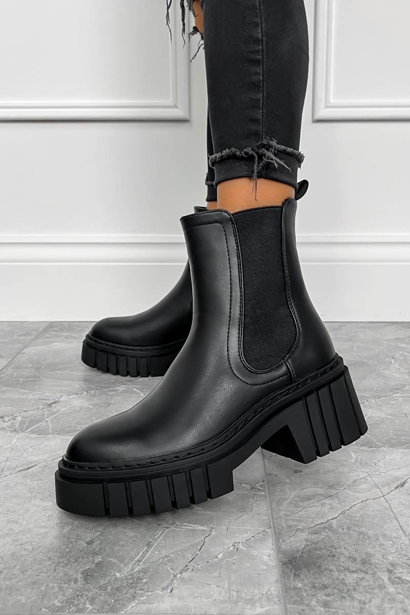 Our Sofia boots feature a super chunky platform sole, Chelsea boot design and elasticated side panels for an easy fit.  Pair with some black ripped jeans to complete this look  Material: Faux Leather Also available in blackSOFIA Chunky Platform Ankle Boots - Black